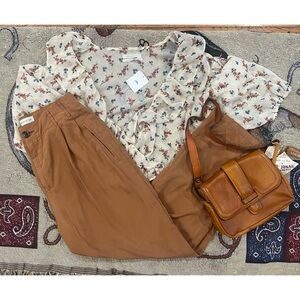 UO brownish red pleated pants.